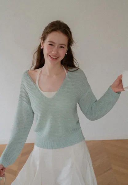 Ladies V‑Neck Knitted Pullover and White Cami Set