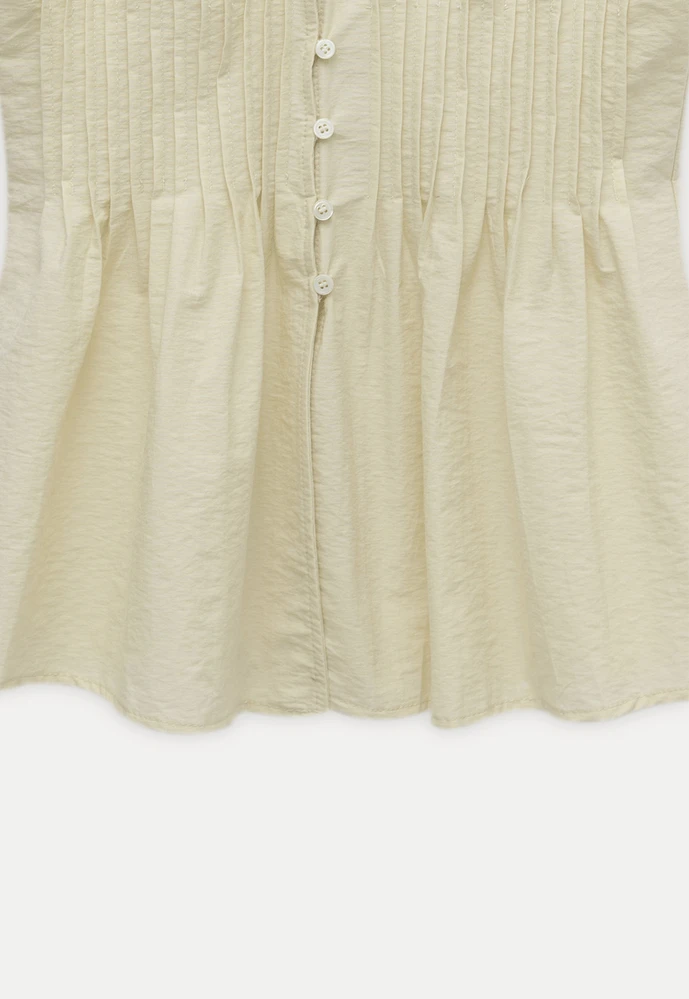 Women’s Pleated V-Neck Button Peplum Blouse