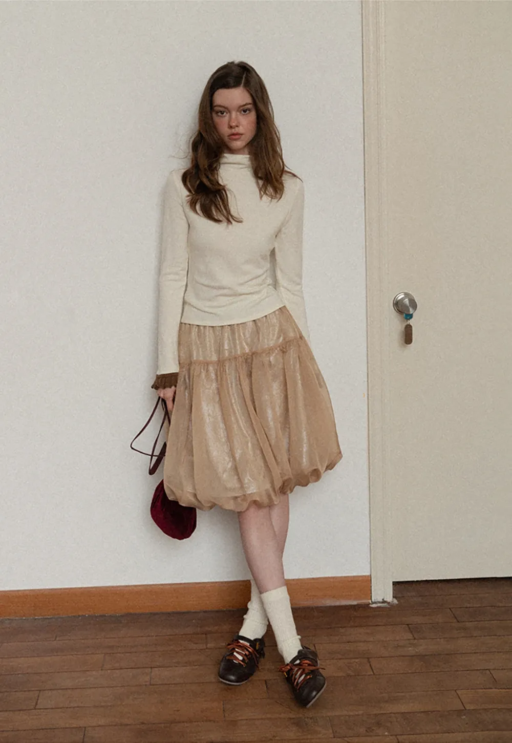 Soft Turtleneck Top with Ruffled Sleeve Cuffs