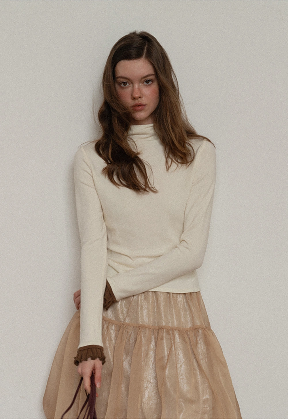 Soft Turtleneck Top with Ruffled Sleeve Cuffs