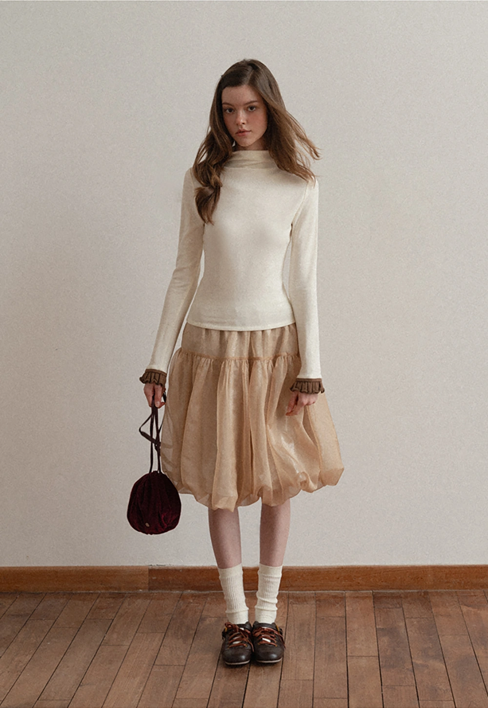 Soft Turtleneck Top with Ruffled Sleeve Cuffs