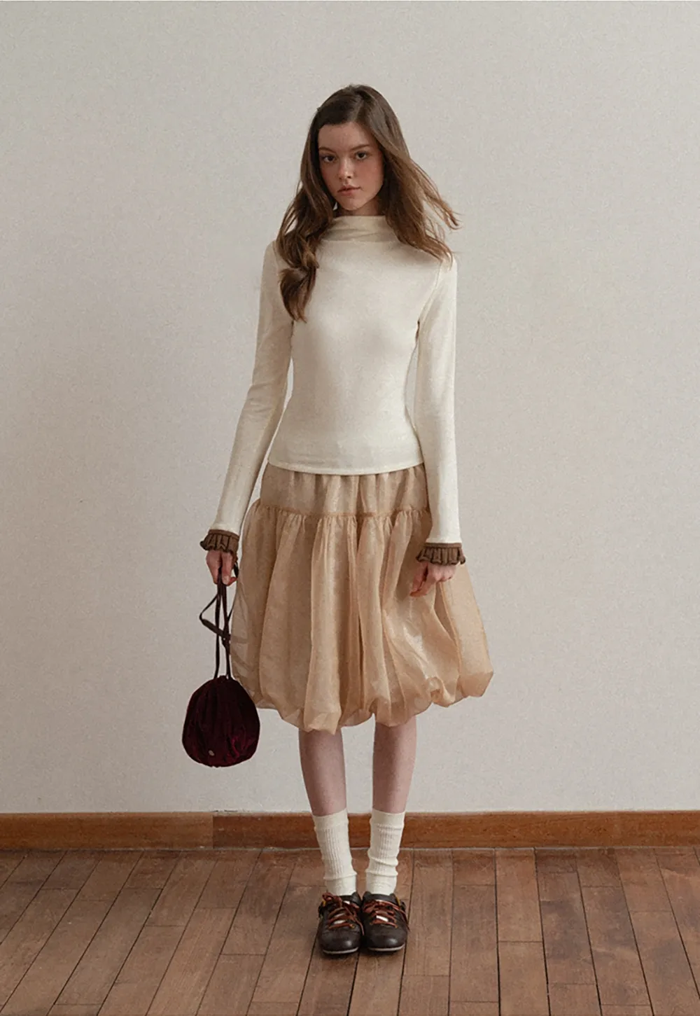 Soft Turtleneck Top with Ruffled Sleeve Cuffs