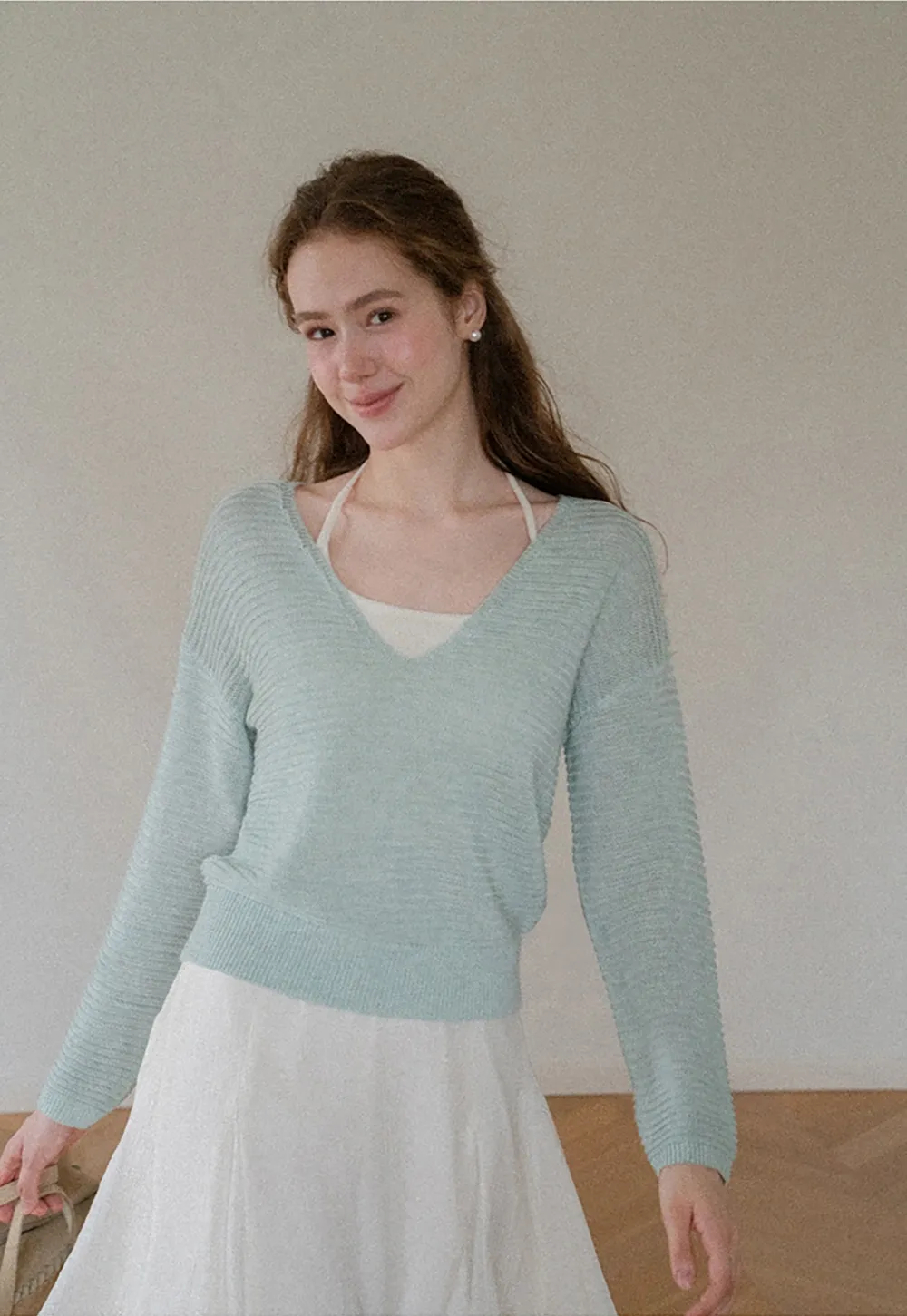 Ladies V‑Neck Knitted Pullover and White Cami Set