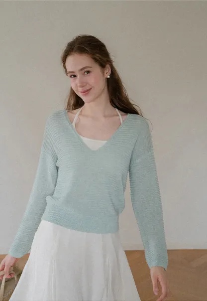 Ladies V‑Neck Knitted Pullover and White Cami Set