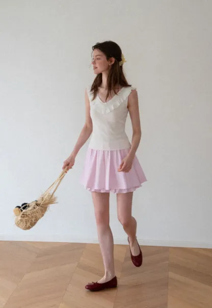 Ruffled Trim Sleeveless Knit Top
