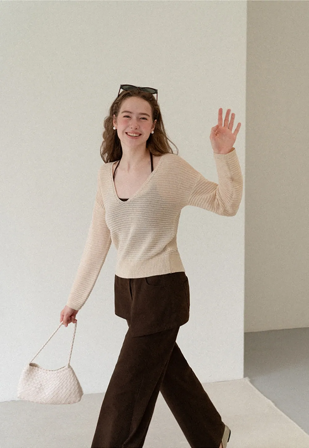 Ladies V‑Neck Knitted Pullover and White Cami Set