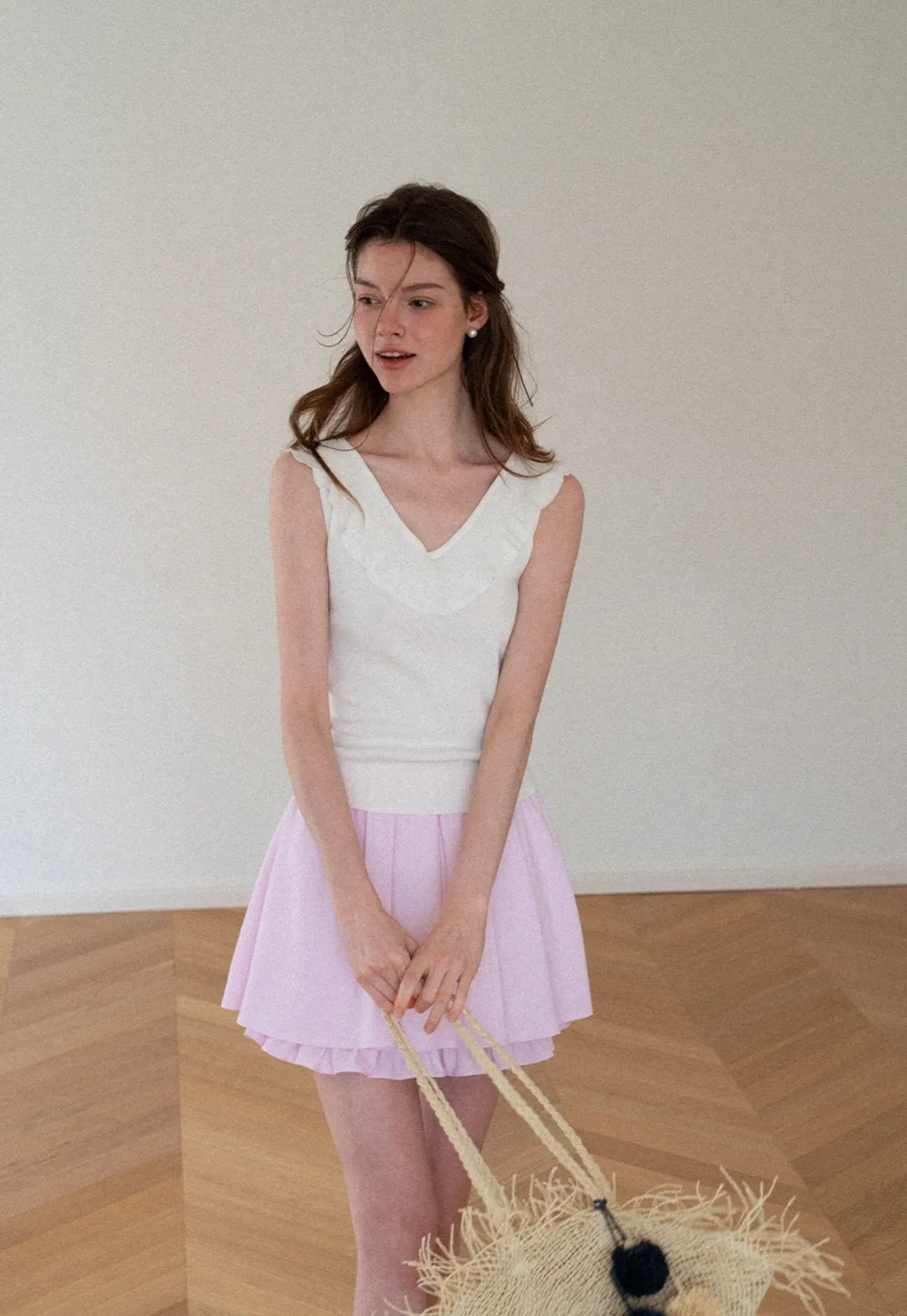 Ruffled Trim Sleeveless Knit Top