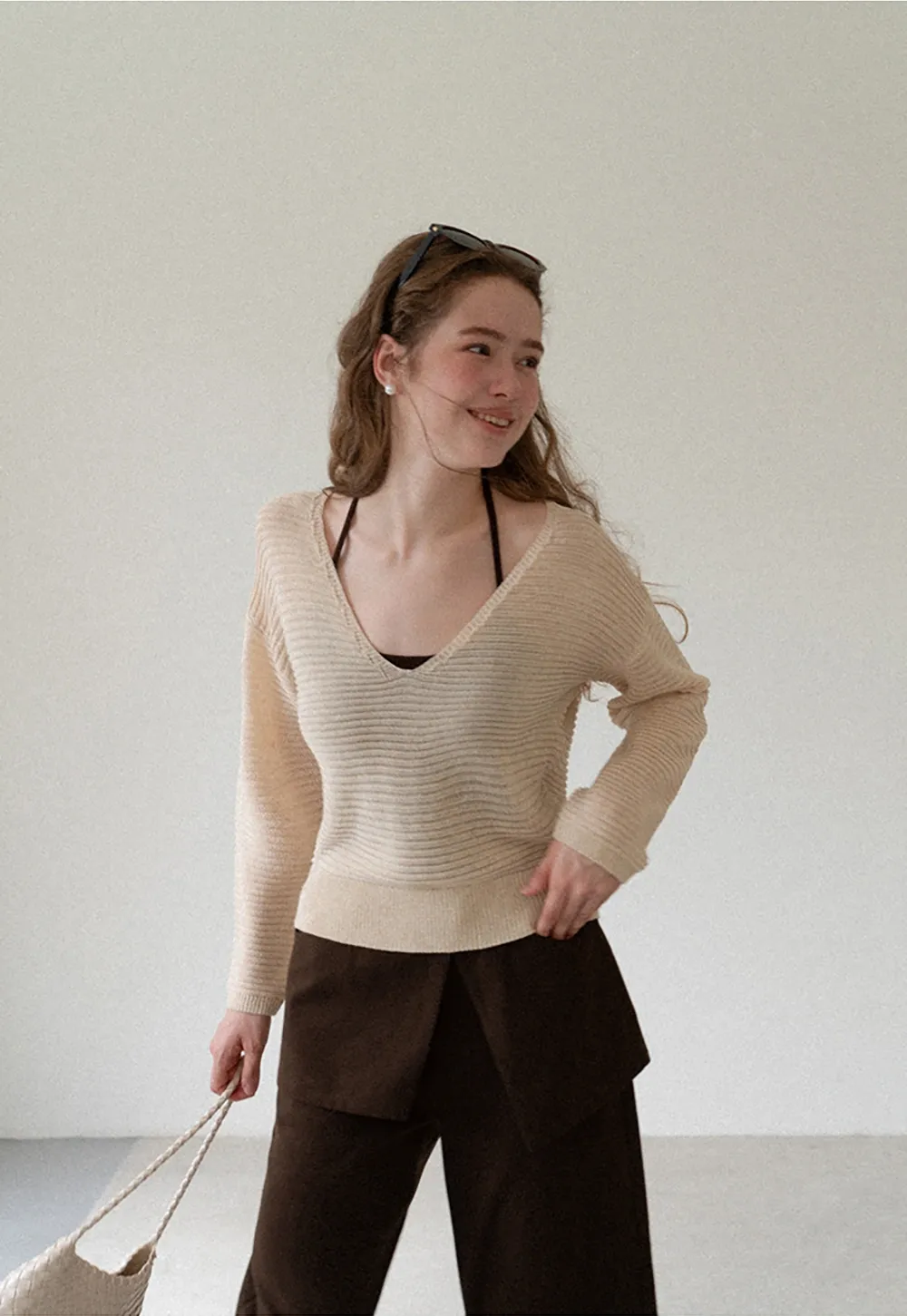 Ladies V‑Neck Knitted Pullover and White Cami Set