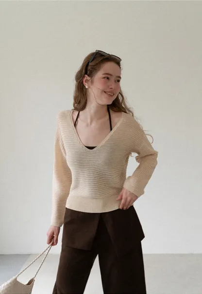 Ladies V‑Neck Knitted Pullover and White Cami Set