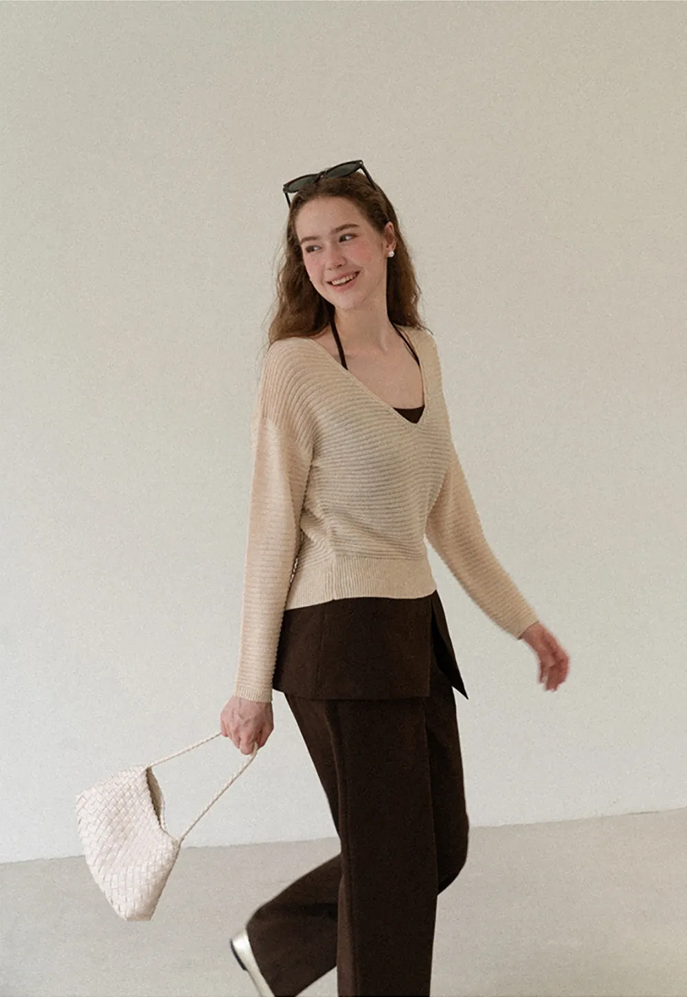 Ladies V‑Neck Knitted Pullover and White Cami Set
