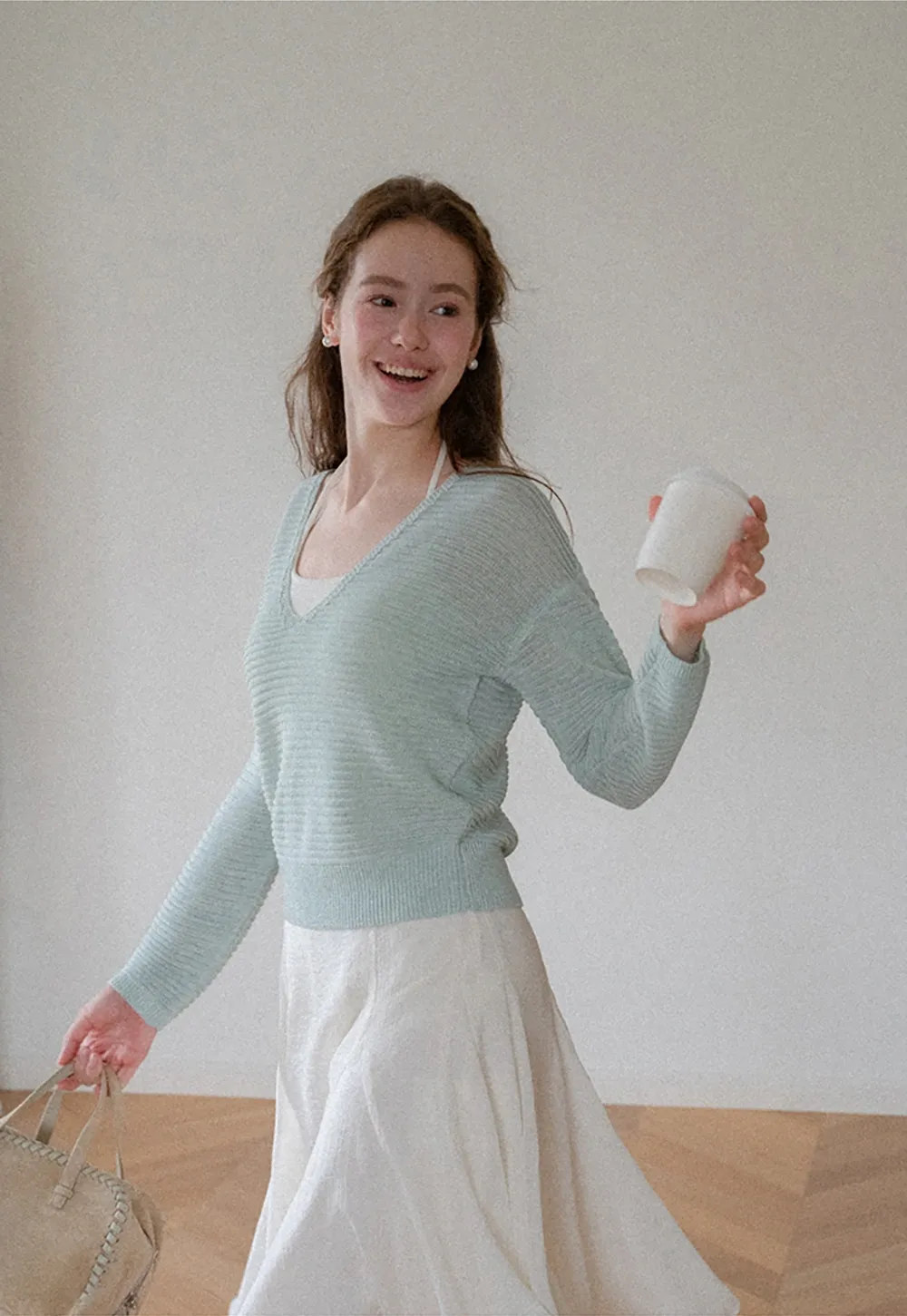 Ladies V‑Neck Knitted Pullover and White Cami Set