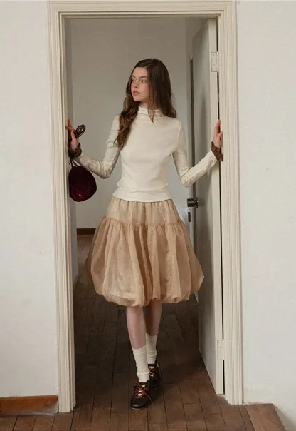 Soft Turtleneck Top with Ruffled Sleeve Cuffs