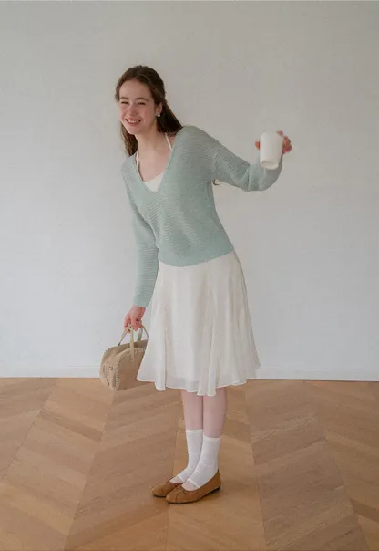 Ladies V‑Neck Knitted Pullover and White Cami Set