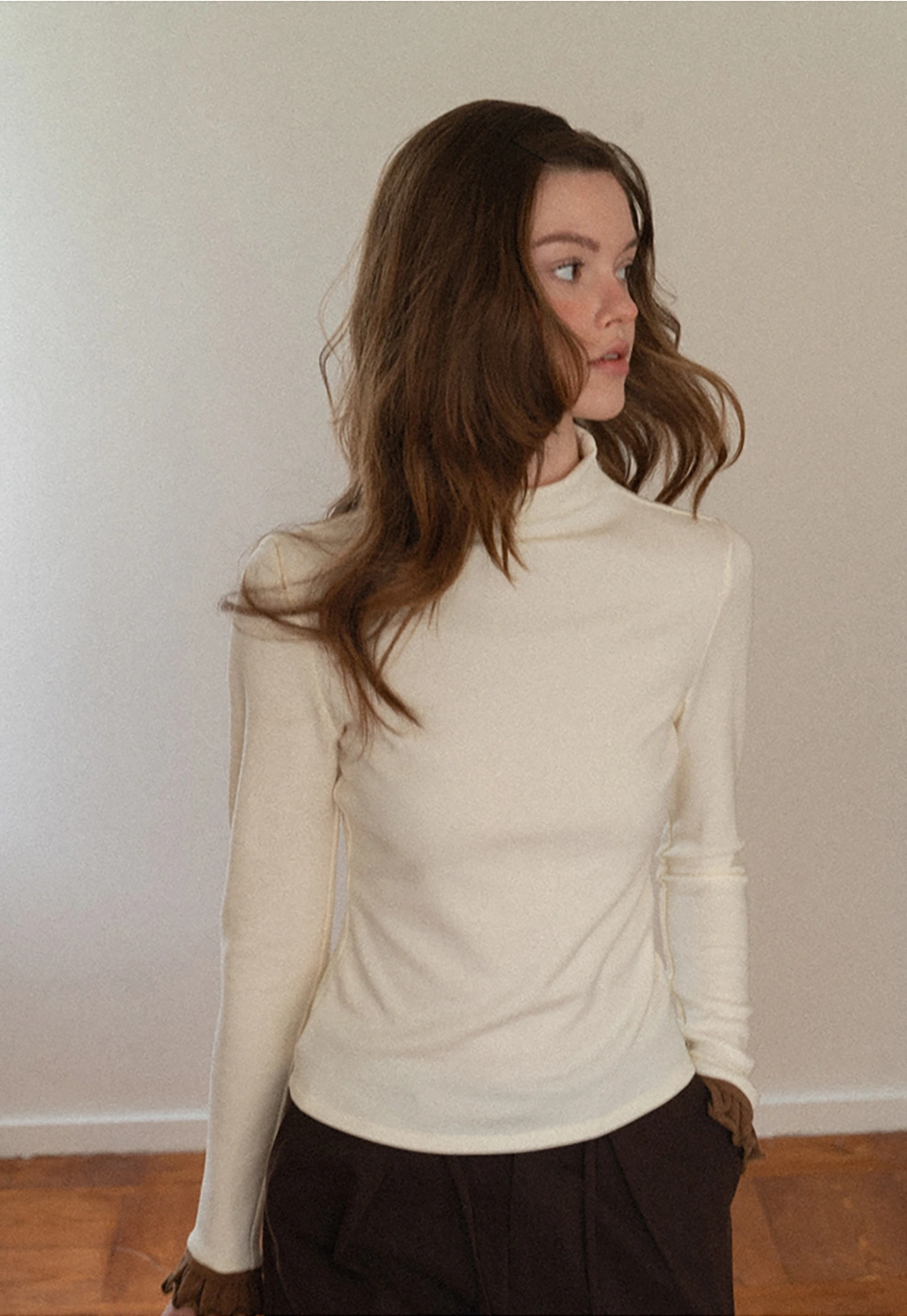 Soft Turtleneck Top with Ruffled Sleeve Cuffs