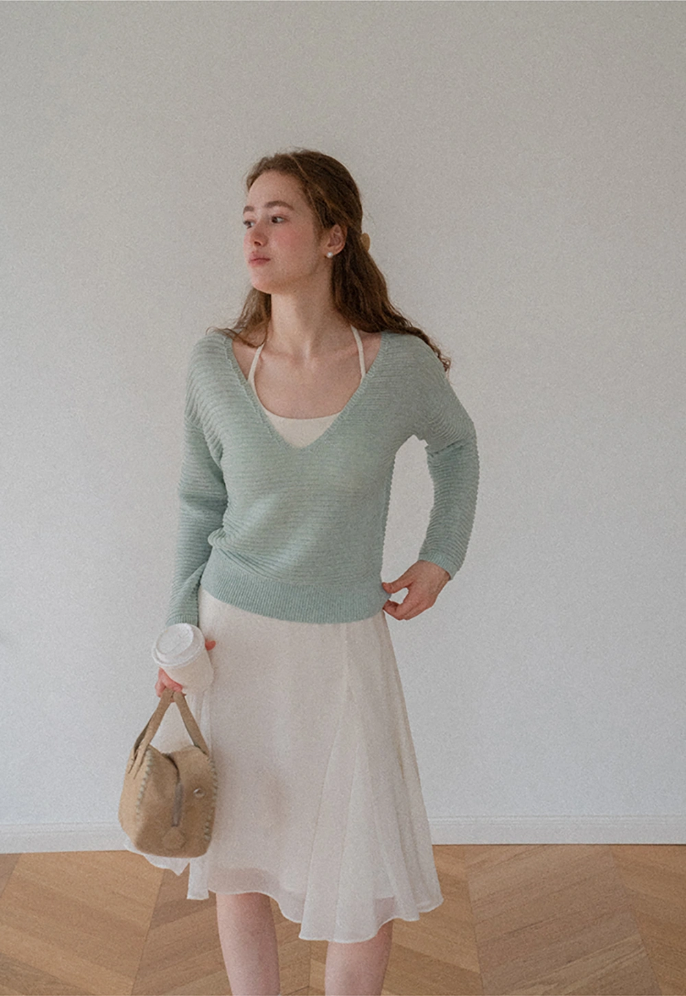 Ladies V‑Neck Knitted Pullover and White Cami Set