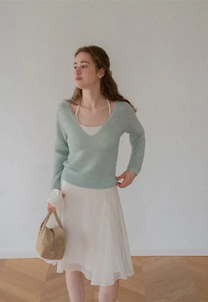 Ladies V‑Neck Knitted Pullover and White Cami Set