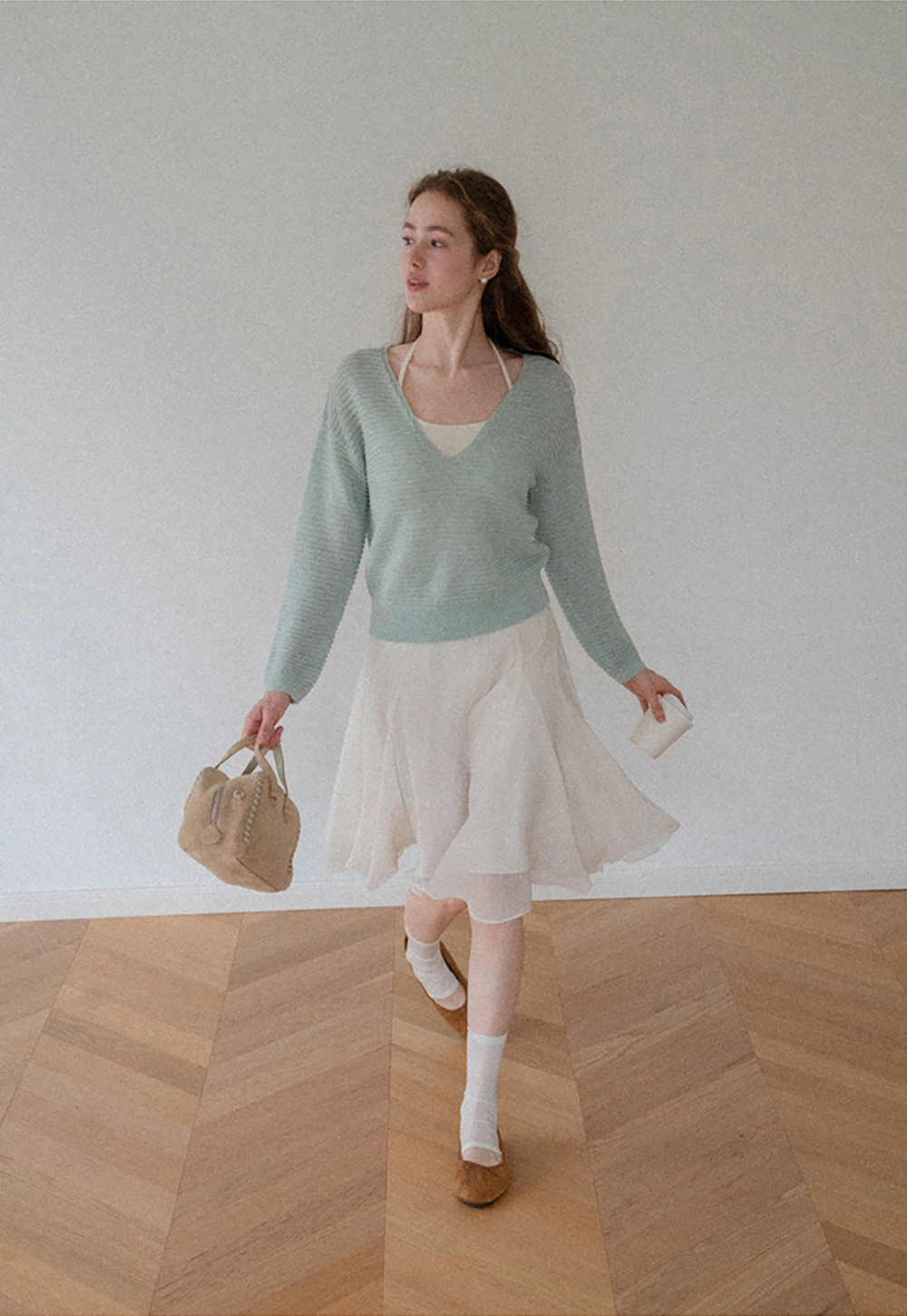 Ladies V‑Neck Knitted Pullover and White Cami Set