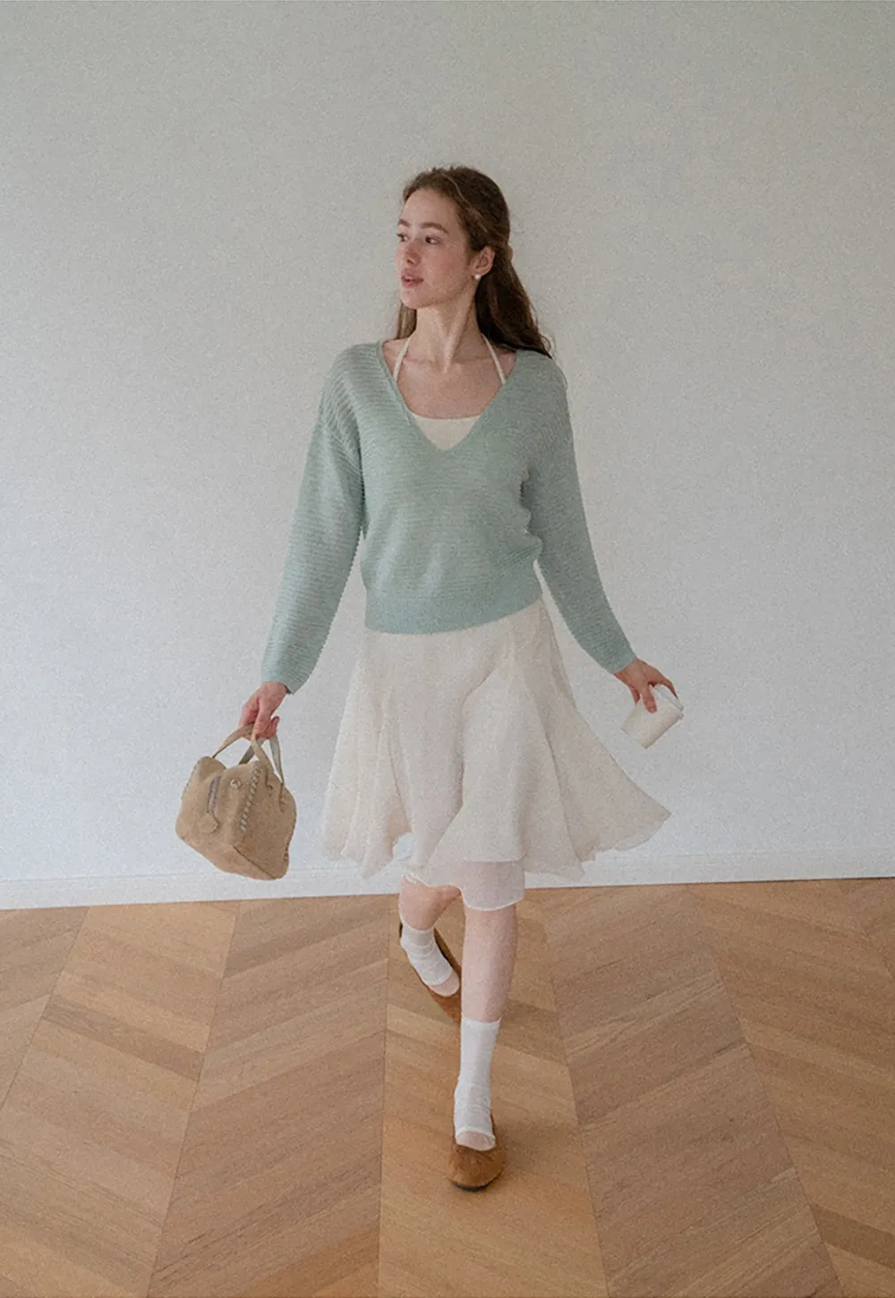 Ladies V‑Neck Knitted Pullover and White Cami Set