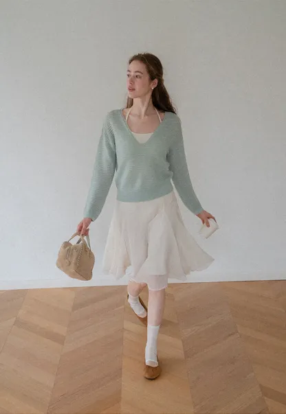 Ladies V‑Neck Knitted Pullover and White Cami Set