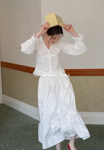 Shirt with ruffled sleeves and layered skirt