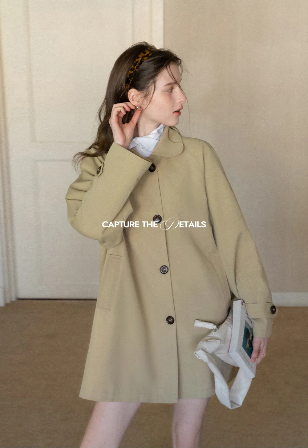 Elegant Trench Coat with Button Detailing and Pockets