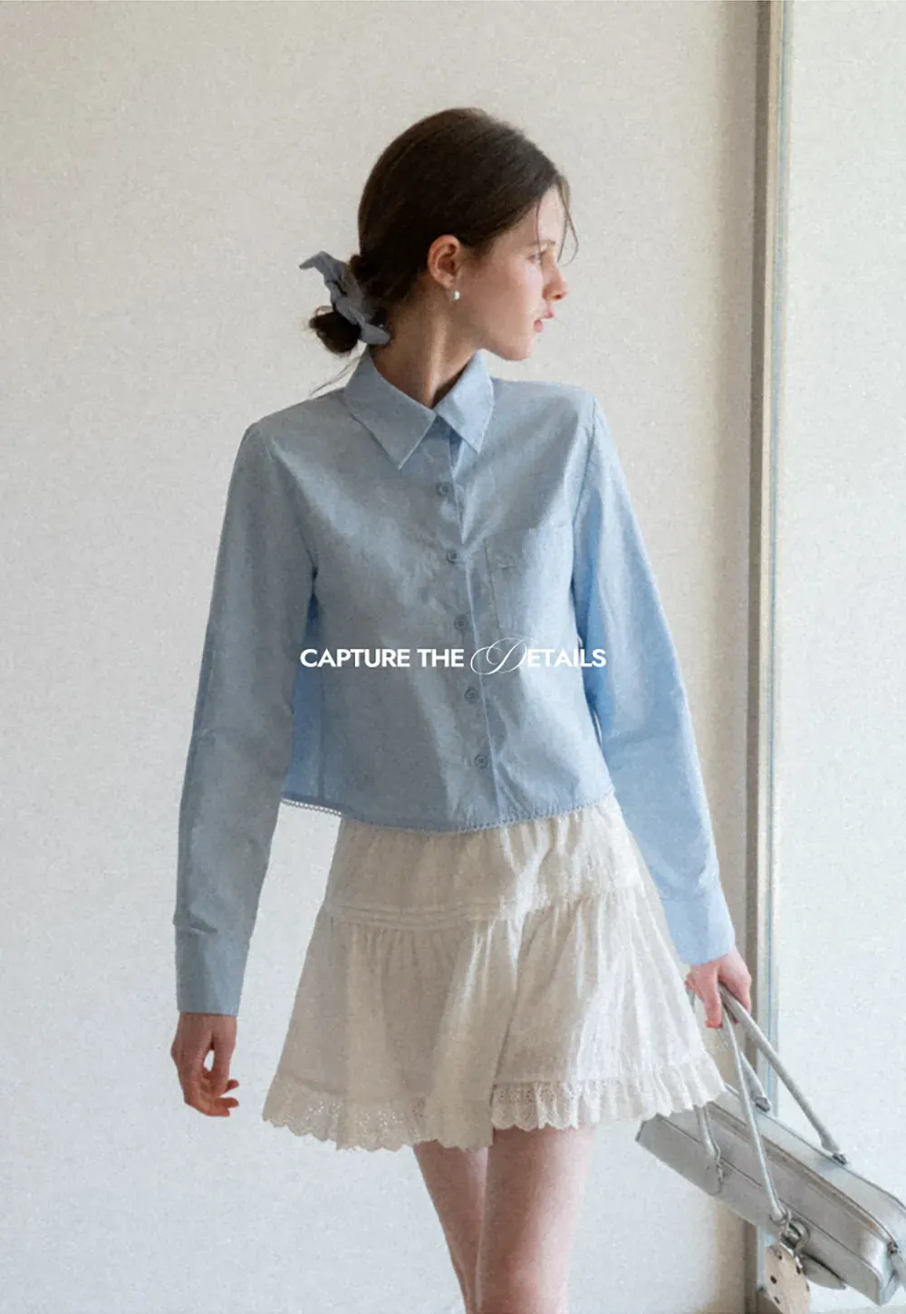 Long sleeve button front shirt with scalloped hem