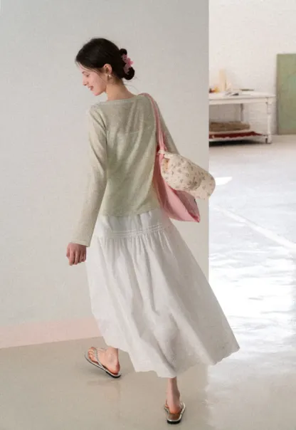 Long sleeve sheer knit top with round neckline