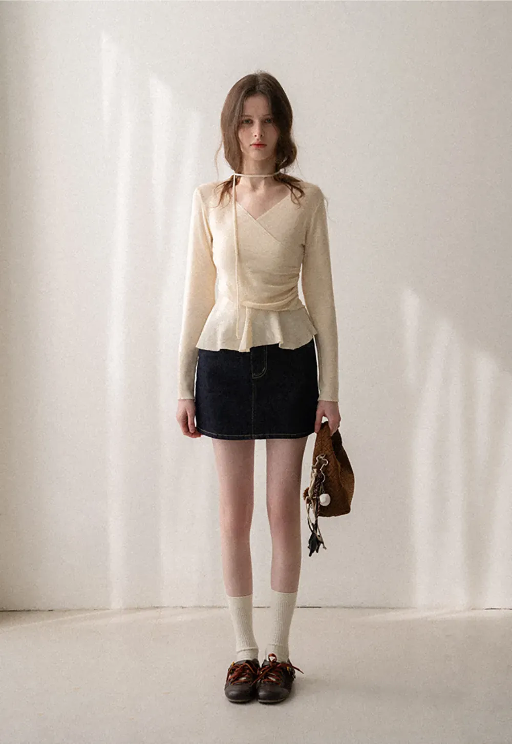 Long sleeve wrap knit sweater with ruched detail