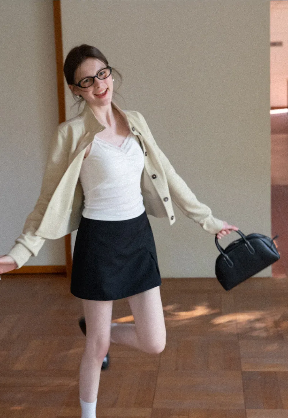 Short jacket with button front and ribbed cuffs