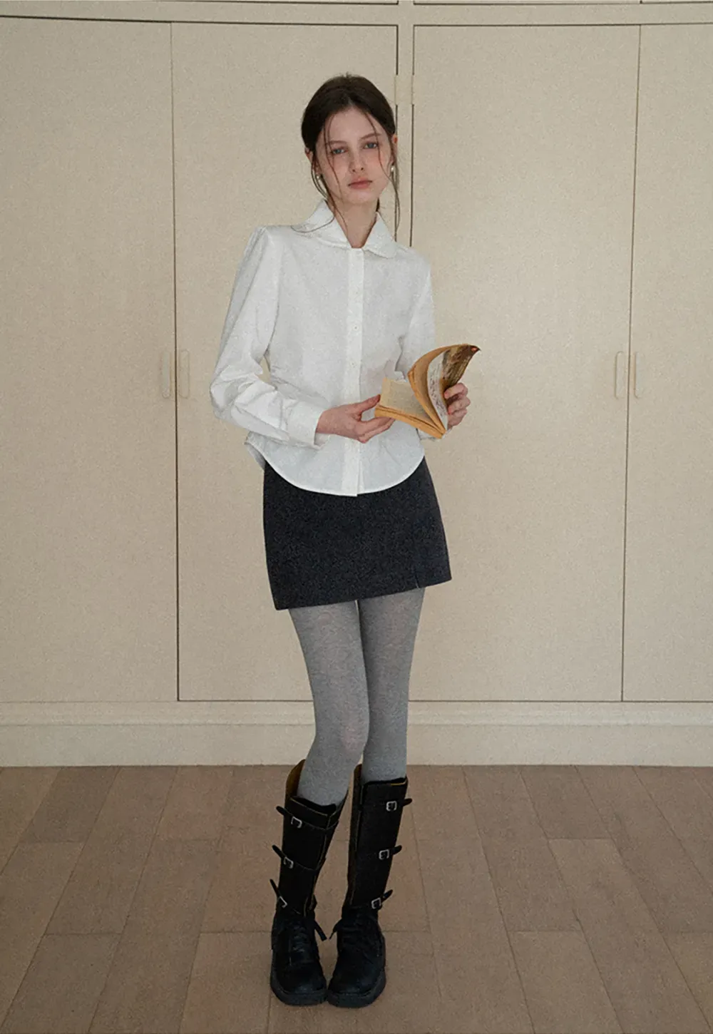 A-line mini skirt with textured fabric and central seam design