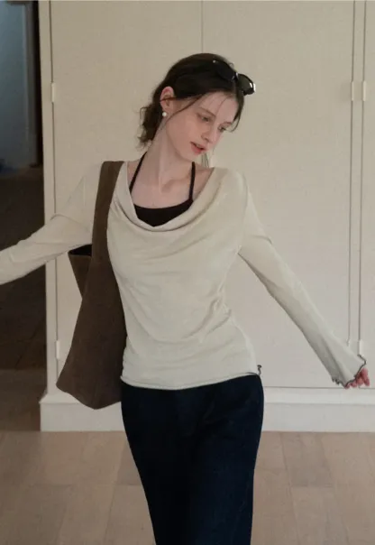 Beige Long-Sleeve Top with Ruffled Hem and Bow Tie Back