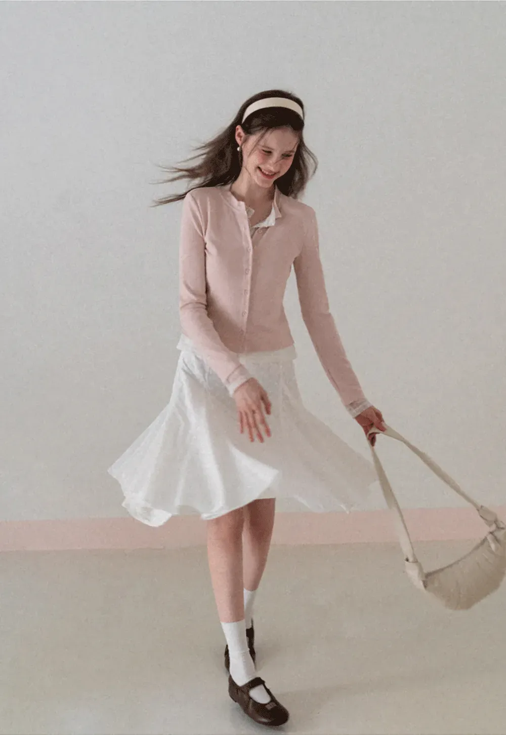 Long sleeve button front knit top with collar