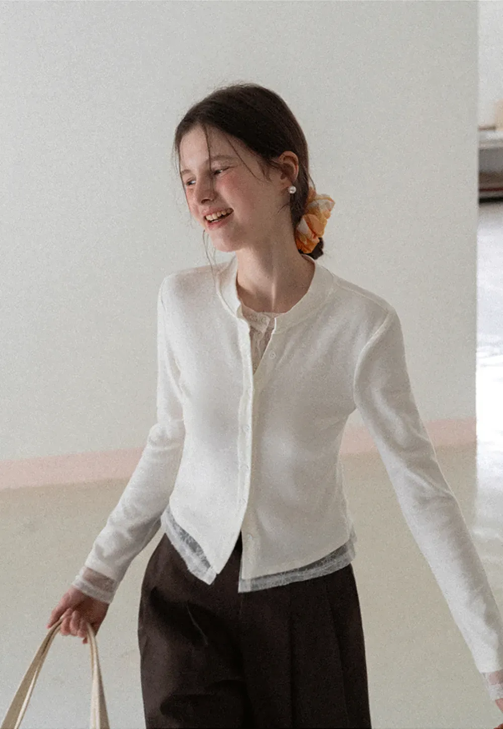 Long sleeve button front knit top with collar