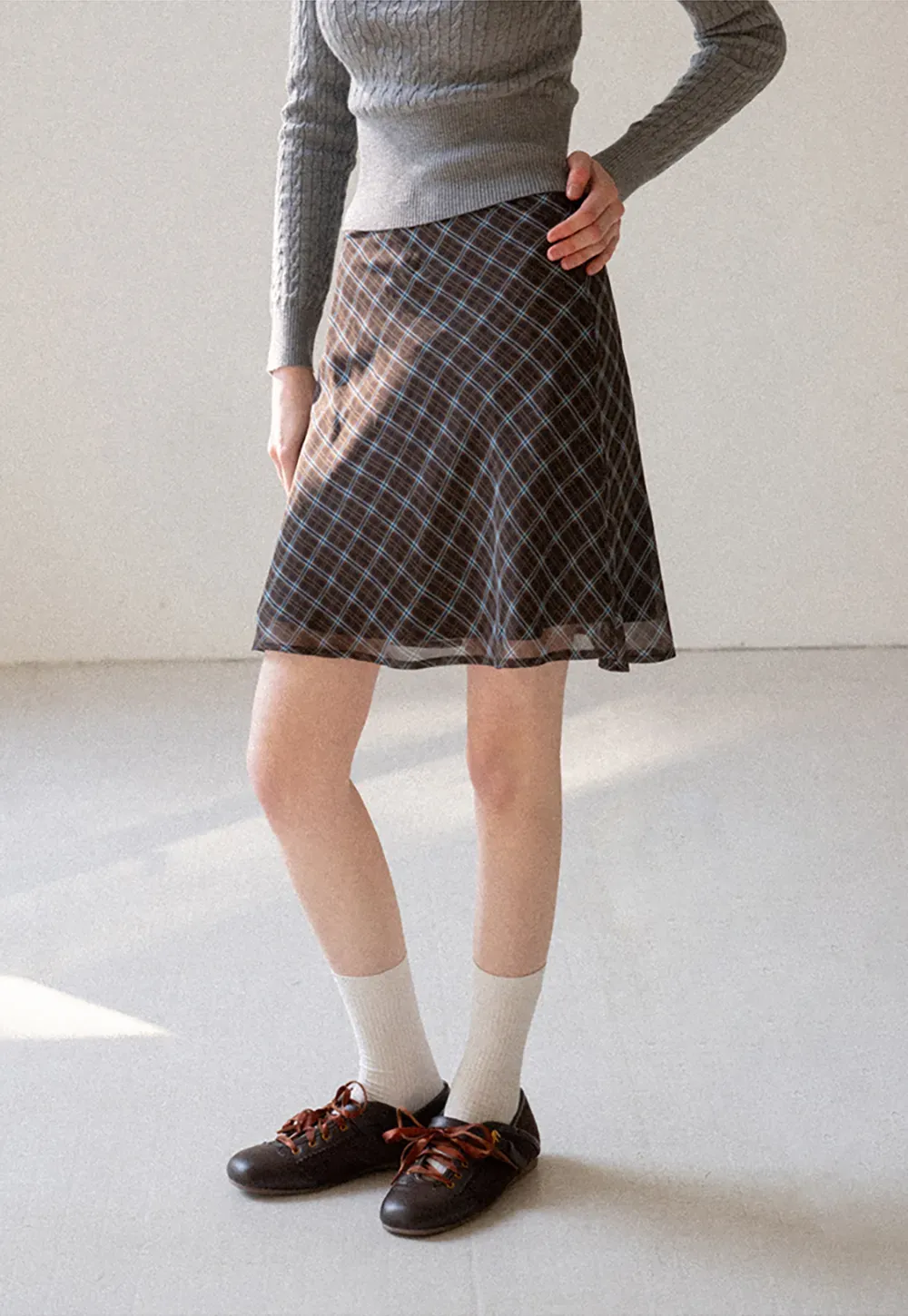 Plaid Skirt with Flowy Hem Design