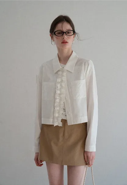 Short jacket with ruffled front placket and collar