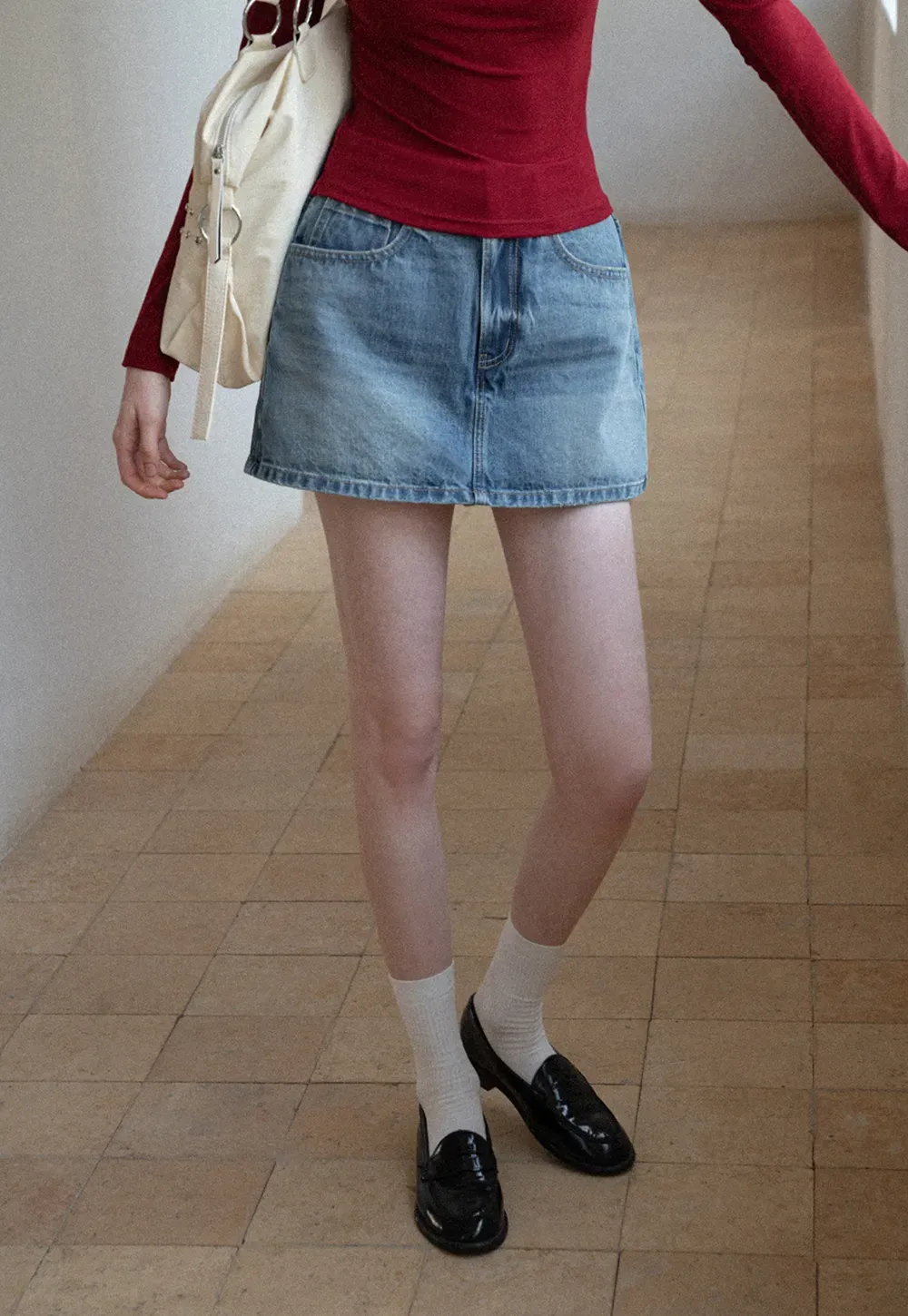 Denim Mini Skirt with Front Pocket and Frayed Hem