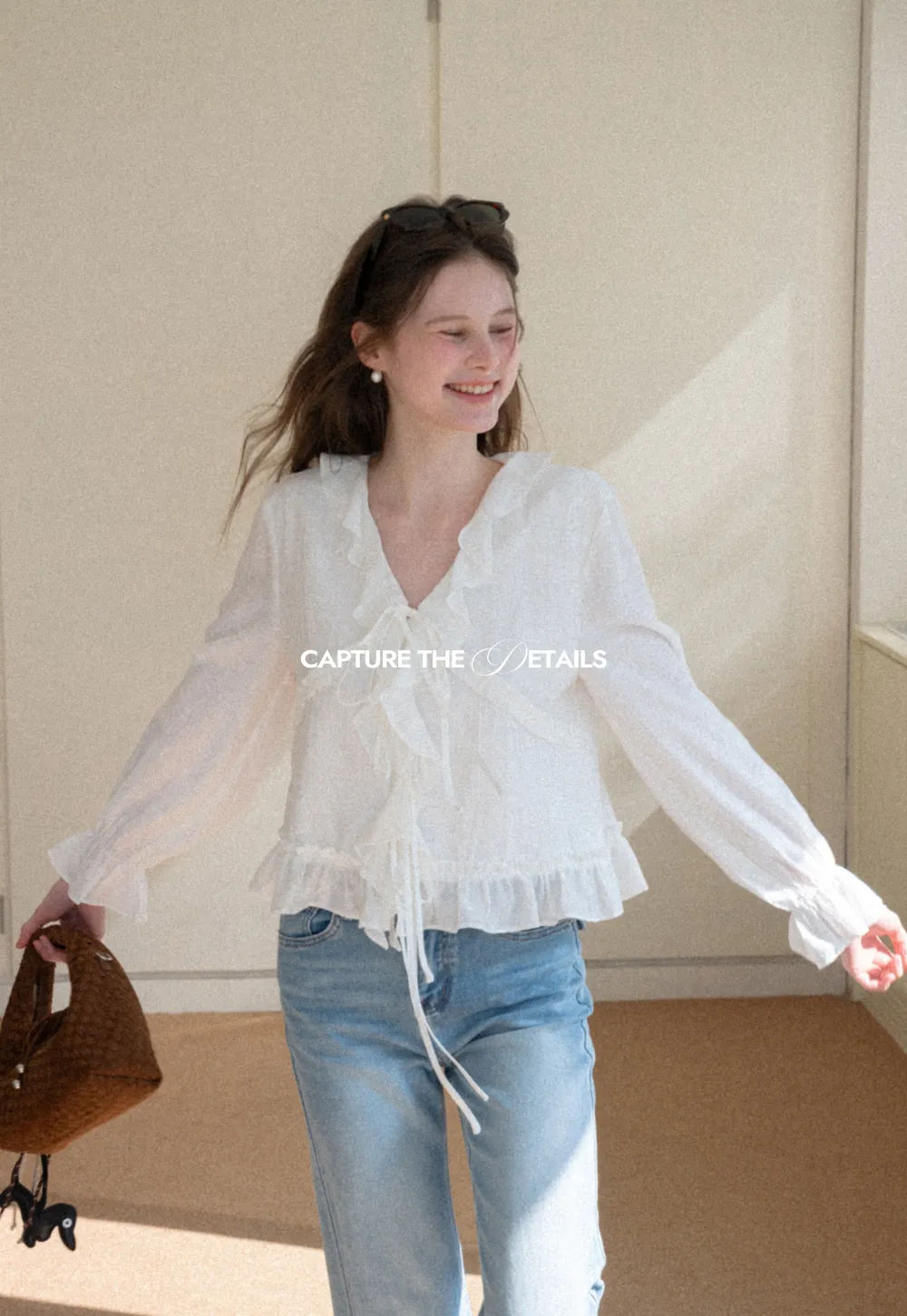 Elegant Blouse with Ruffle Detail and Tie Front Design