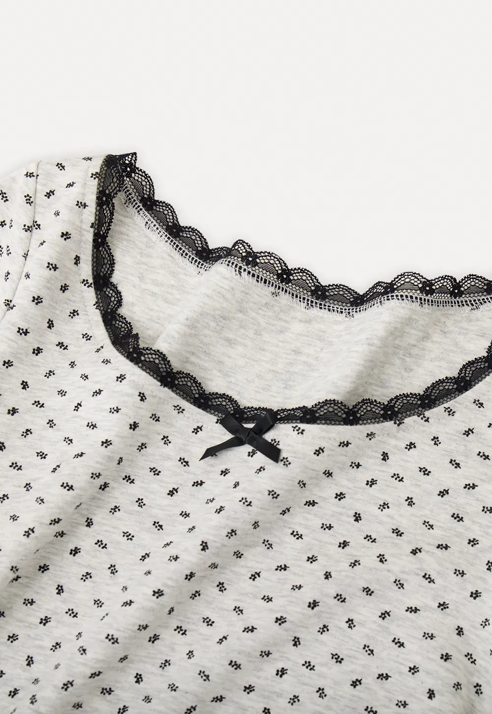 Polka dot dress with lace trim and matching cardigan