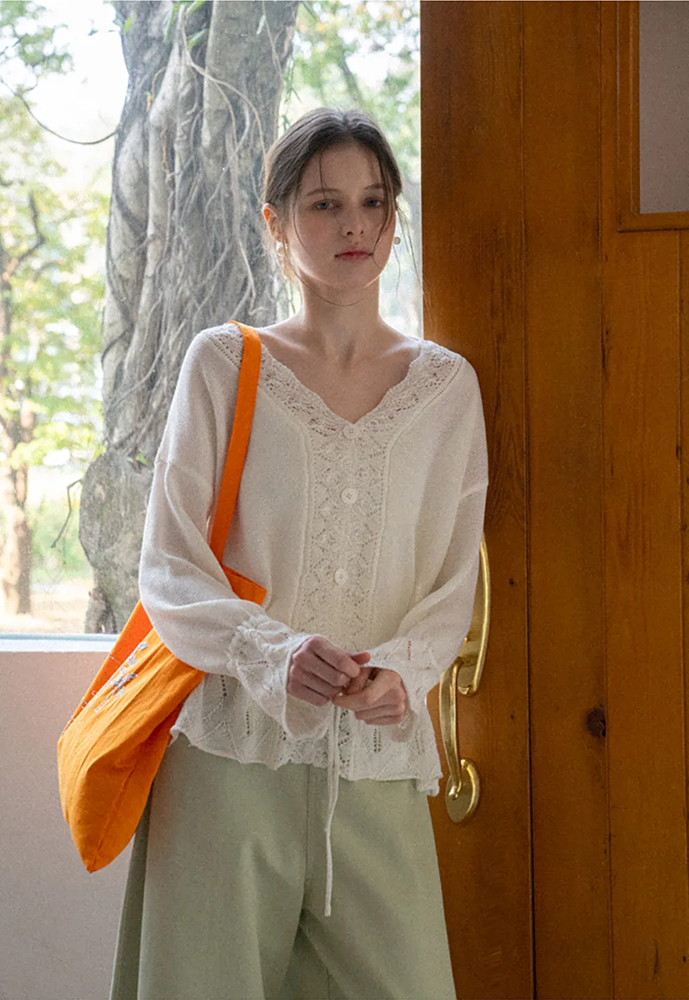 Lace Trimmed V Neck Knit Sweater with Drawstring Hem