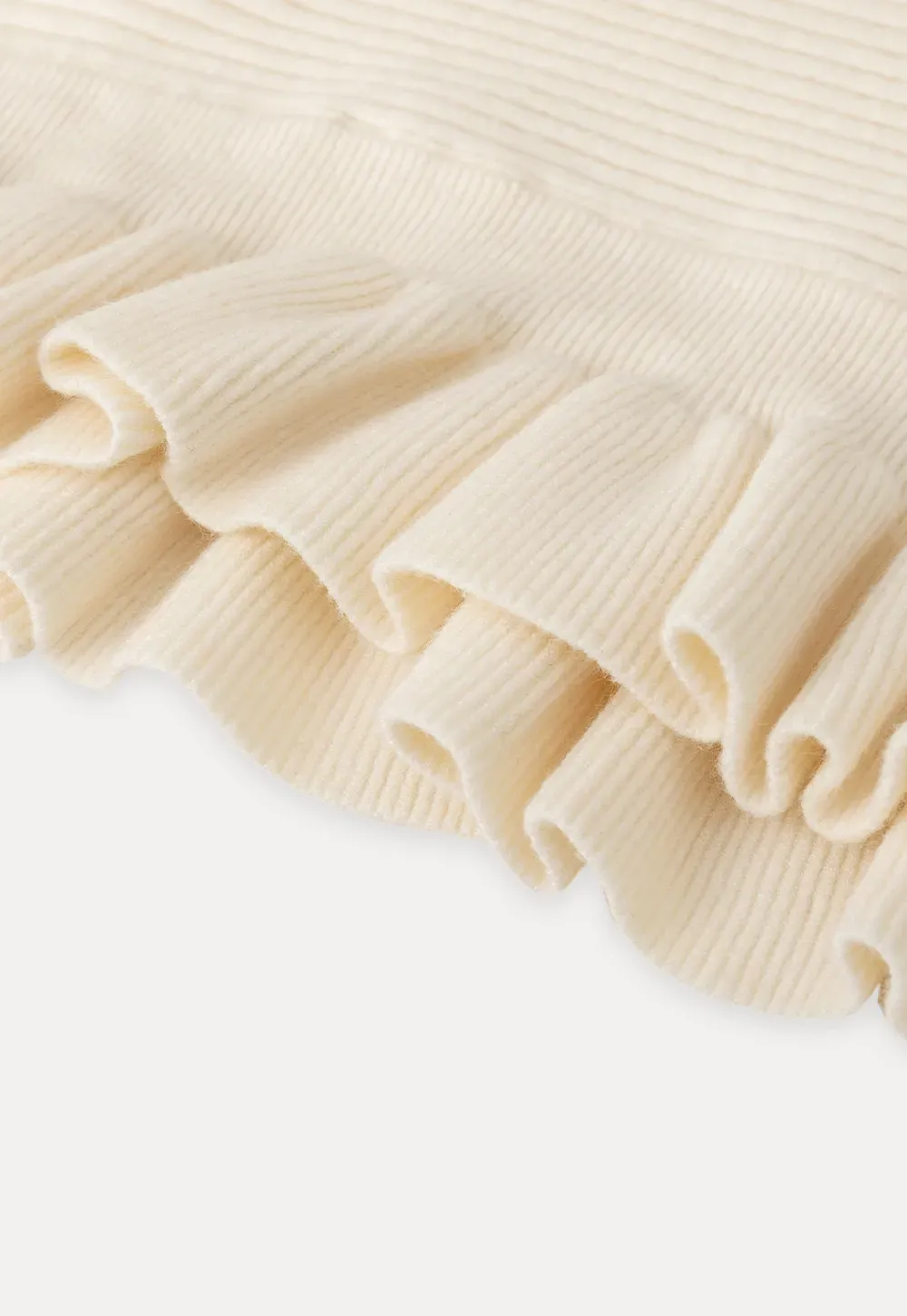 Ribbed knit sweater with tie back and flared hem design