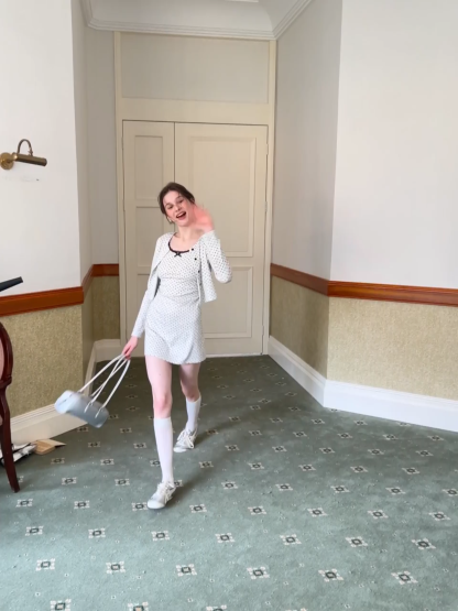 Polka dot dress with lace trim and matching cardigan