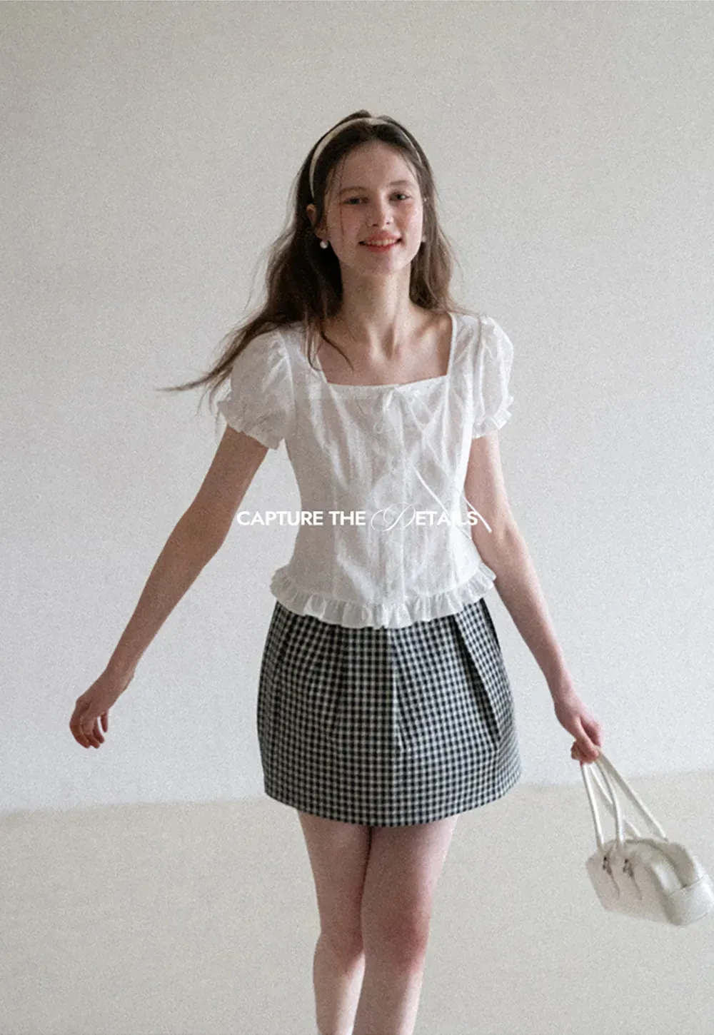 Plaid skirt with pleats and ruffled top