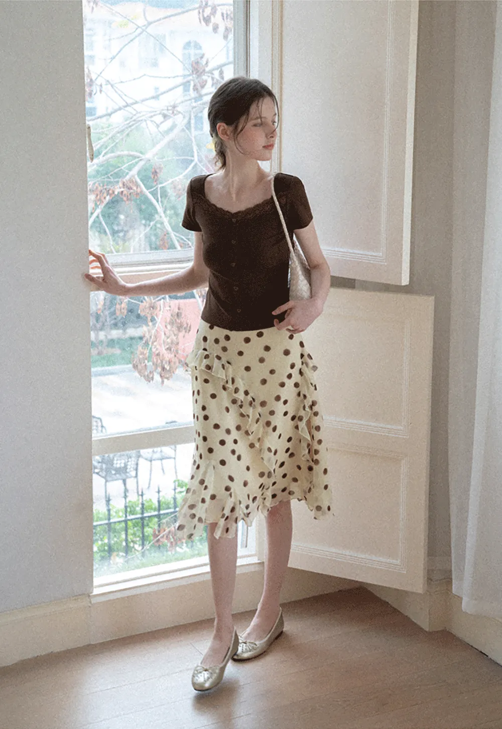 Polka dot ruffled asymmetrical midi skirt