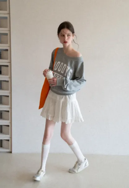 Eyelet Trimmed Tiered Skirt with Ruffled Hem