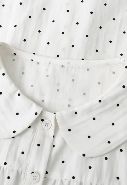Polka dot shirt with ruffled sleeves and Peter Pan collar