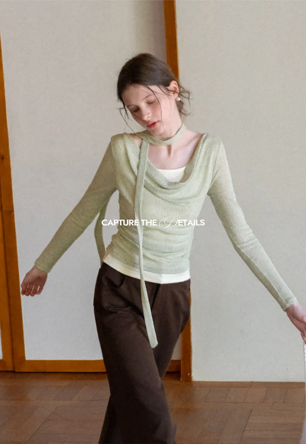 Long sleeve knit top with back tie detail