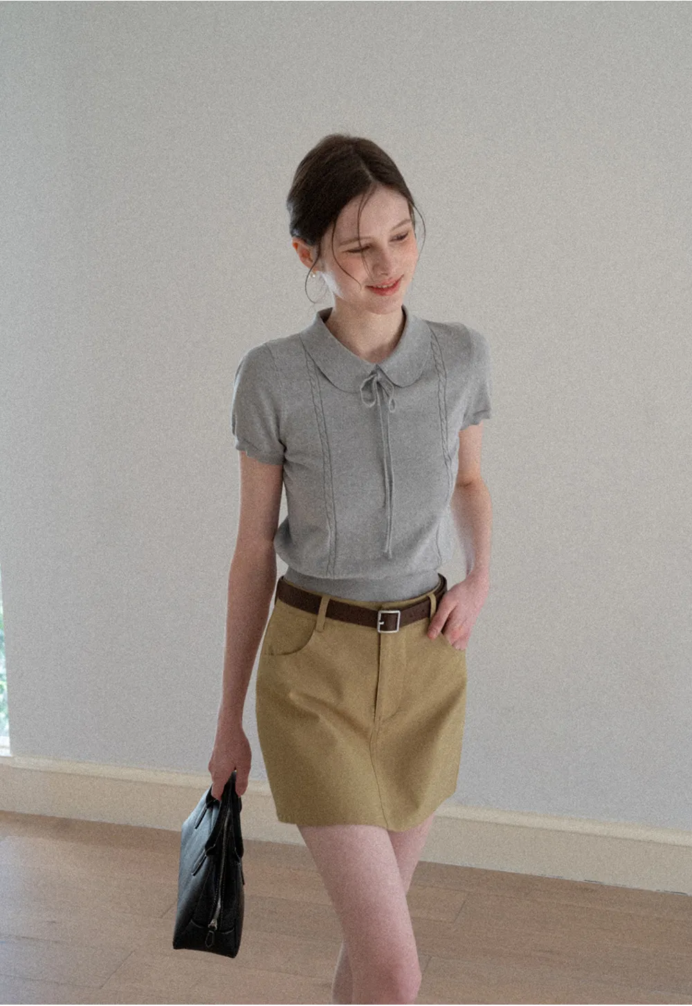 A-line mini skirt with front pockets and belt loops