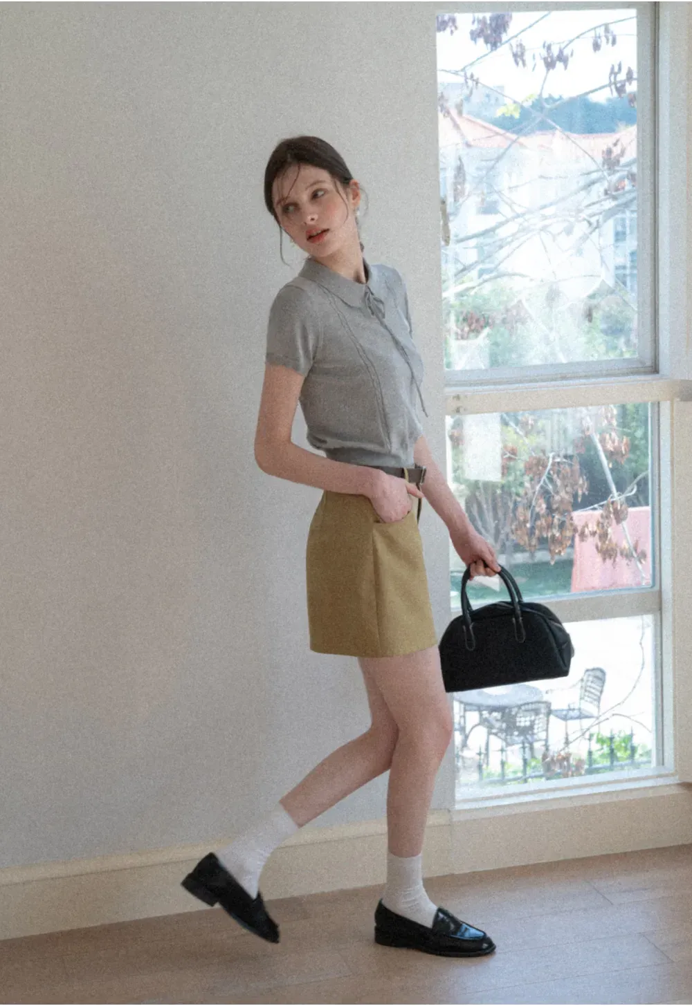 A-line mini skirt with front pockets and belt loops