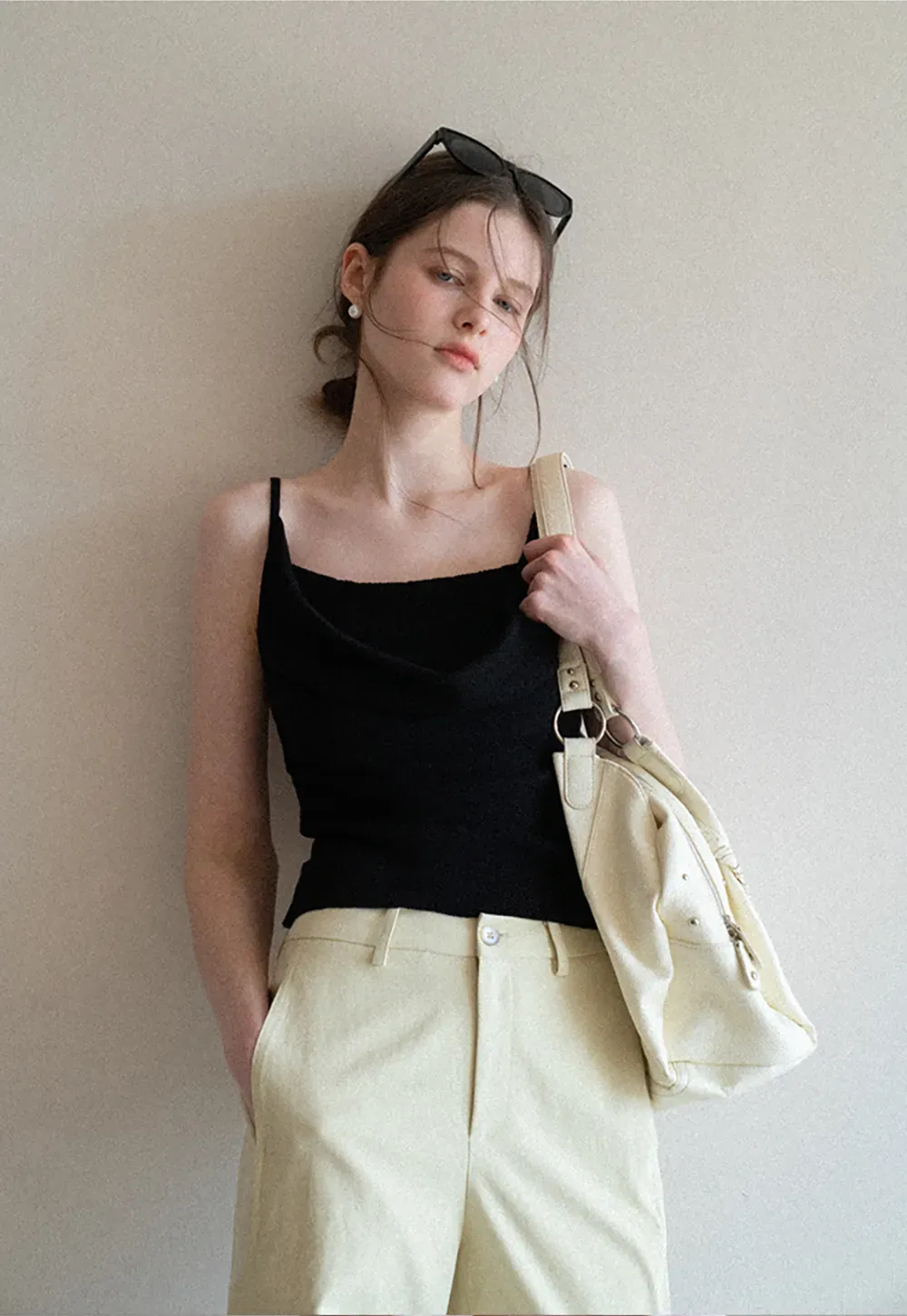 Silk-like tank top with thin straps and draped neckline