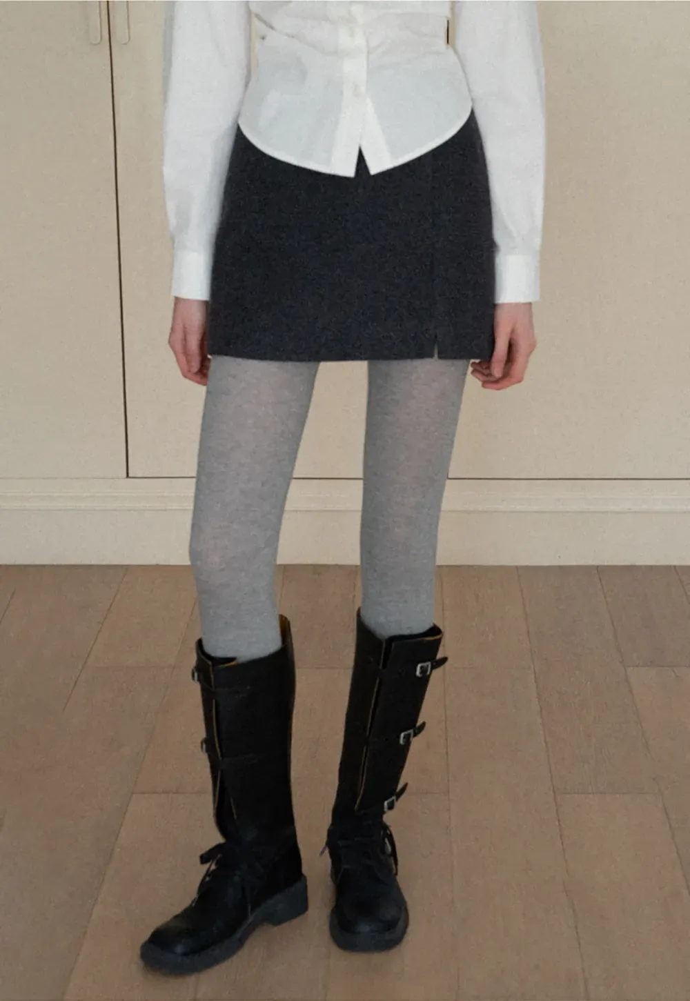 A-line mini skirt with textured fabric and central seam design